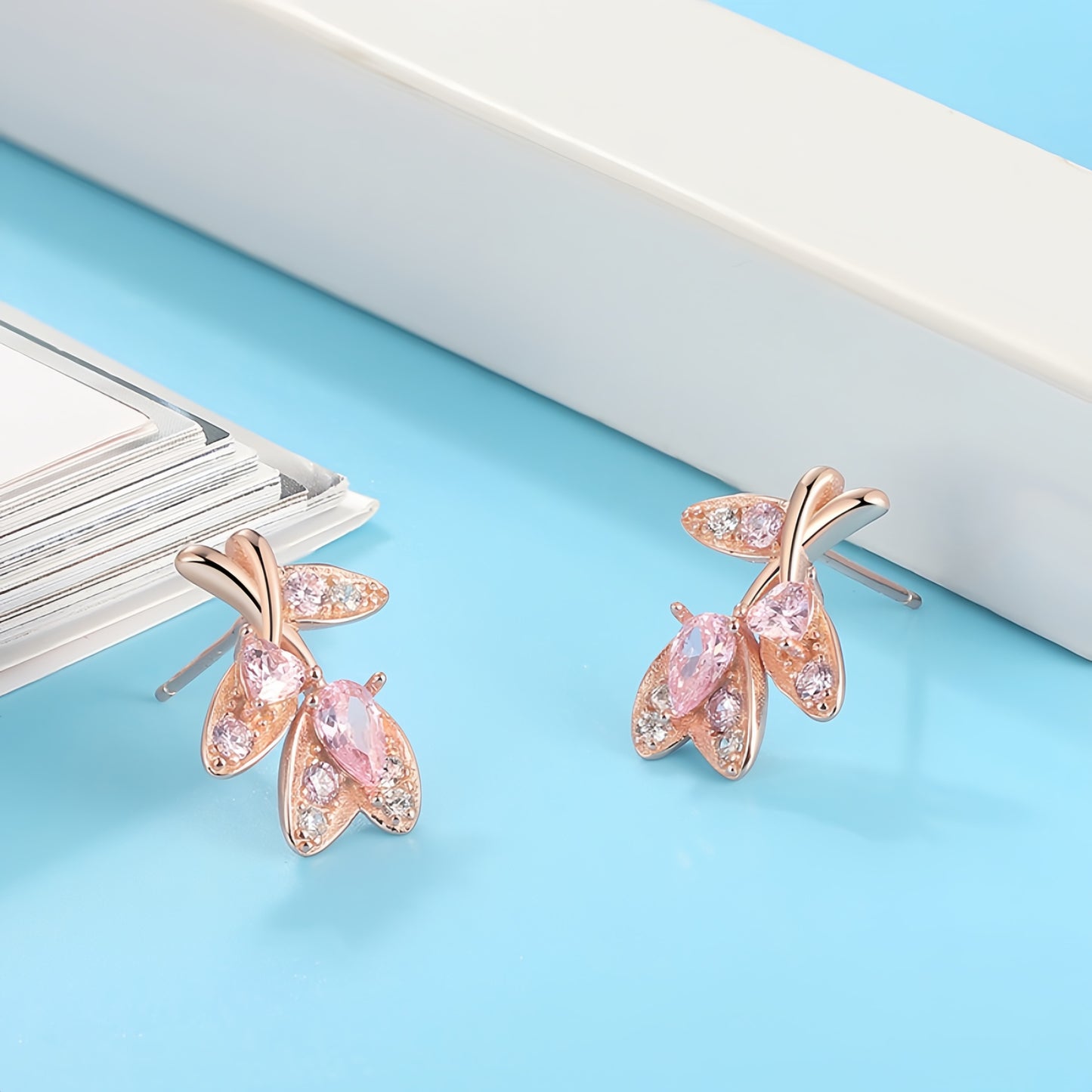 Ohrringe mit Rose und Blättern